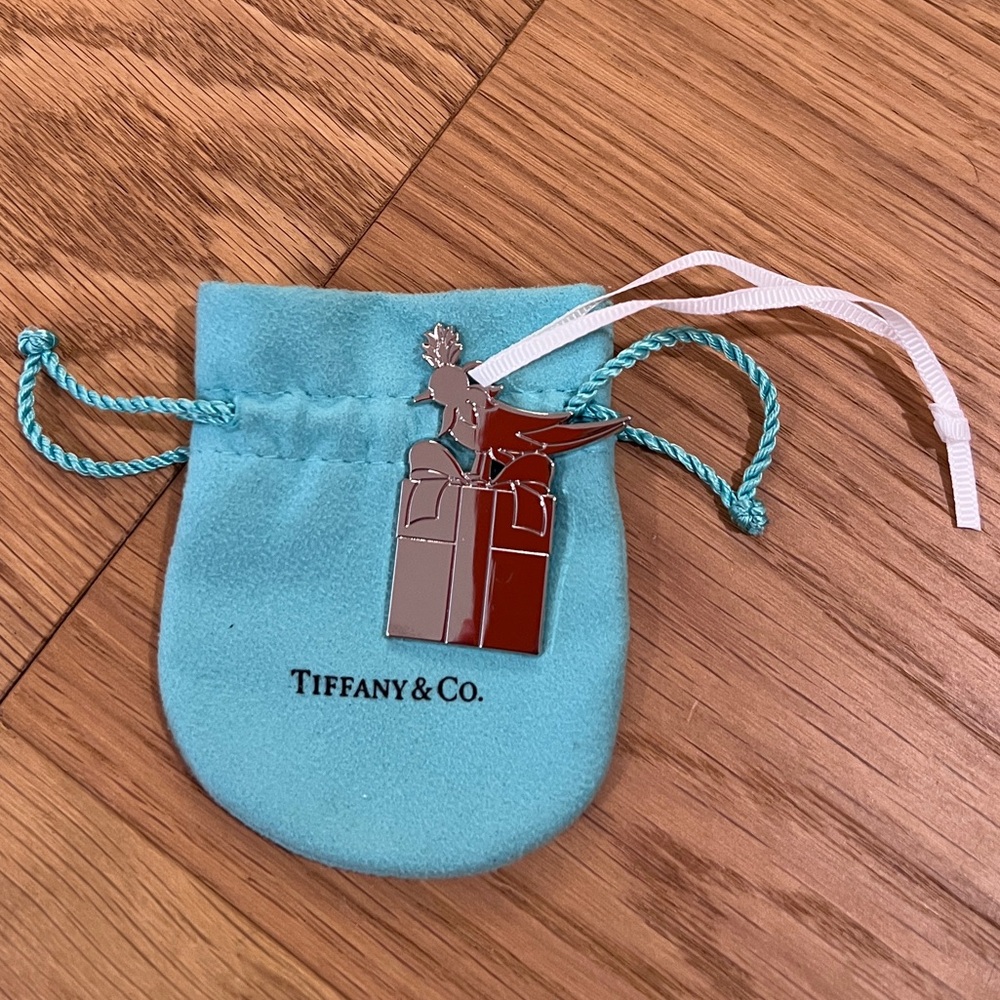 Authentic Tiffany & Co. bird on rock charm